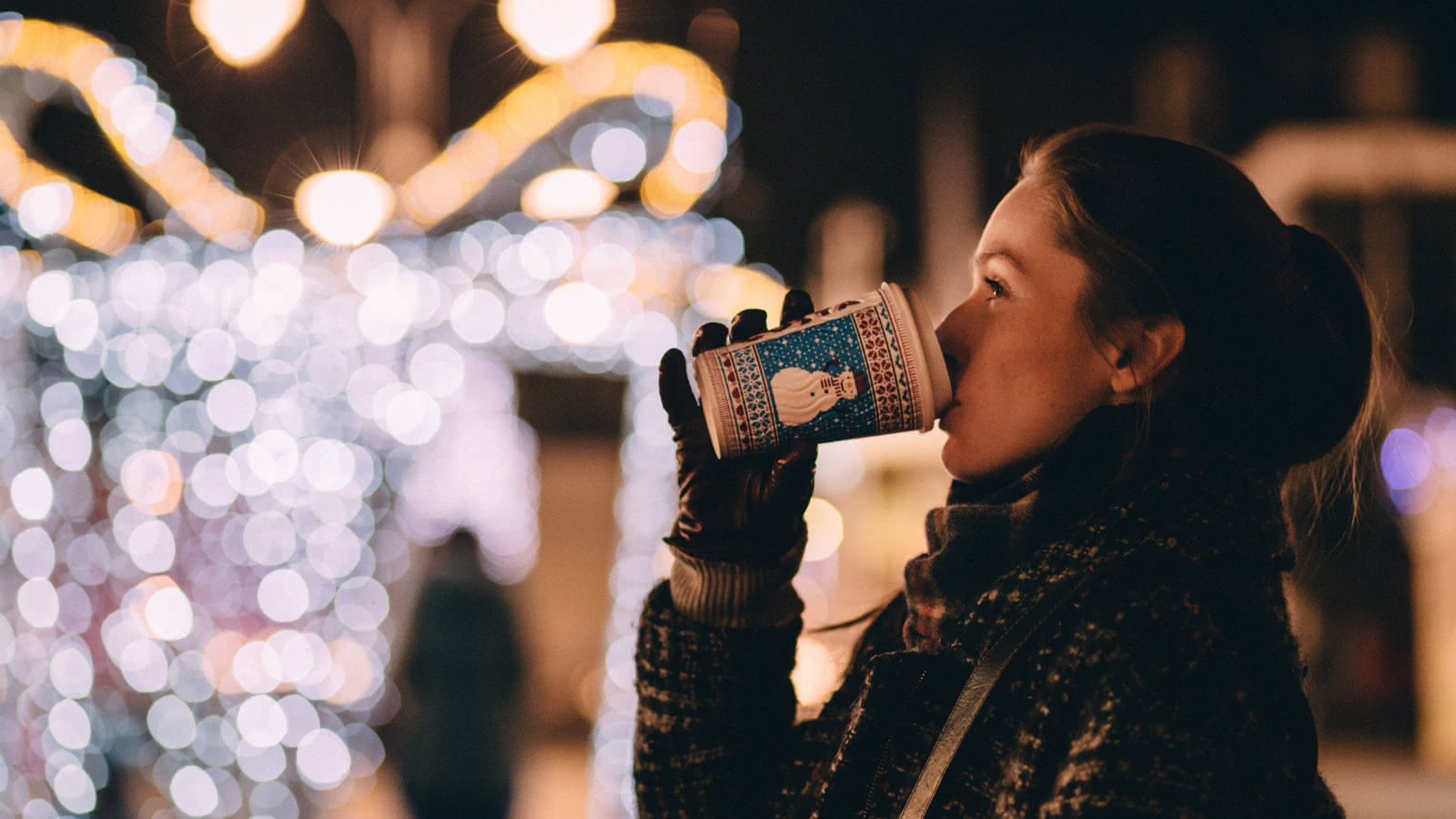 girl with a hot drink in winter