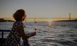 Lisboat Passanger Enjoying The Sunset